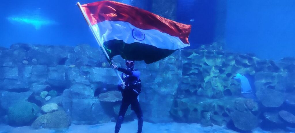 underwater flag waving spectacle